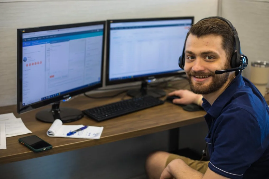 Fleet manager working in the SBL TRANS Tech web portal reviewing ELD logbooks and managing alerts on the dashboard